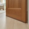 Door draft stopper strip for wooden door